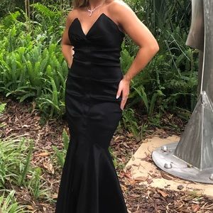 Strapless black formal dress with straps tacked